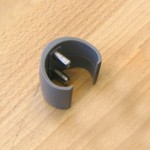 Replaceable clip for tiki SUP paddle or windsurfing boom 